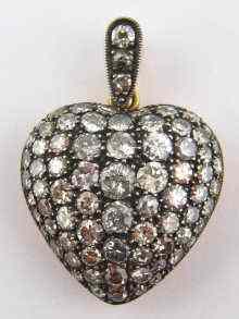 Appraisal: An antique pave set diamond heart pendant approx cm wide