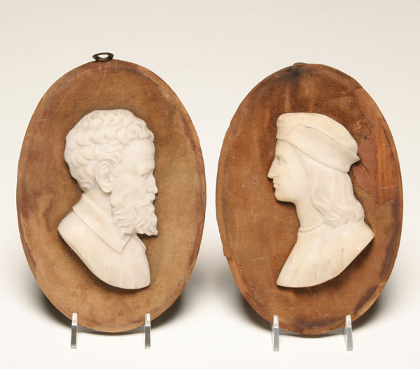 Appraisal: Pair of mid th century alabaster profile cameos depicting Columbus