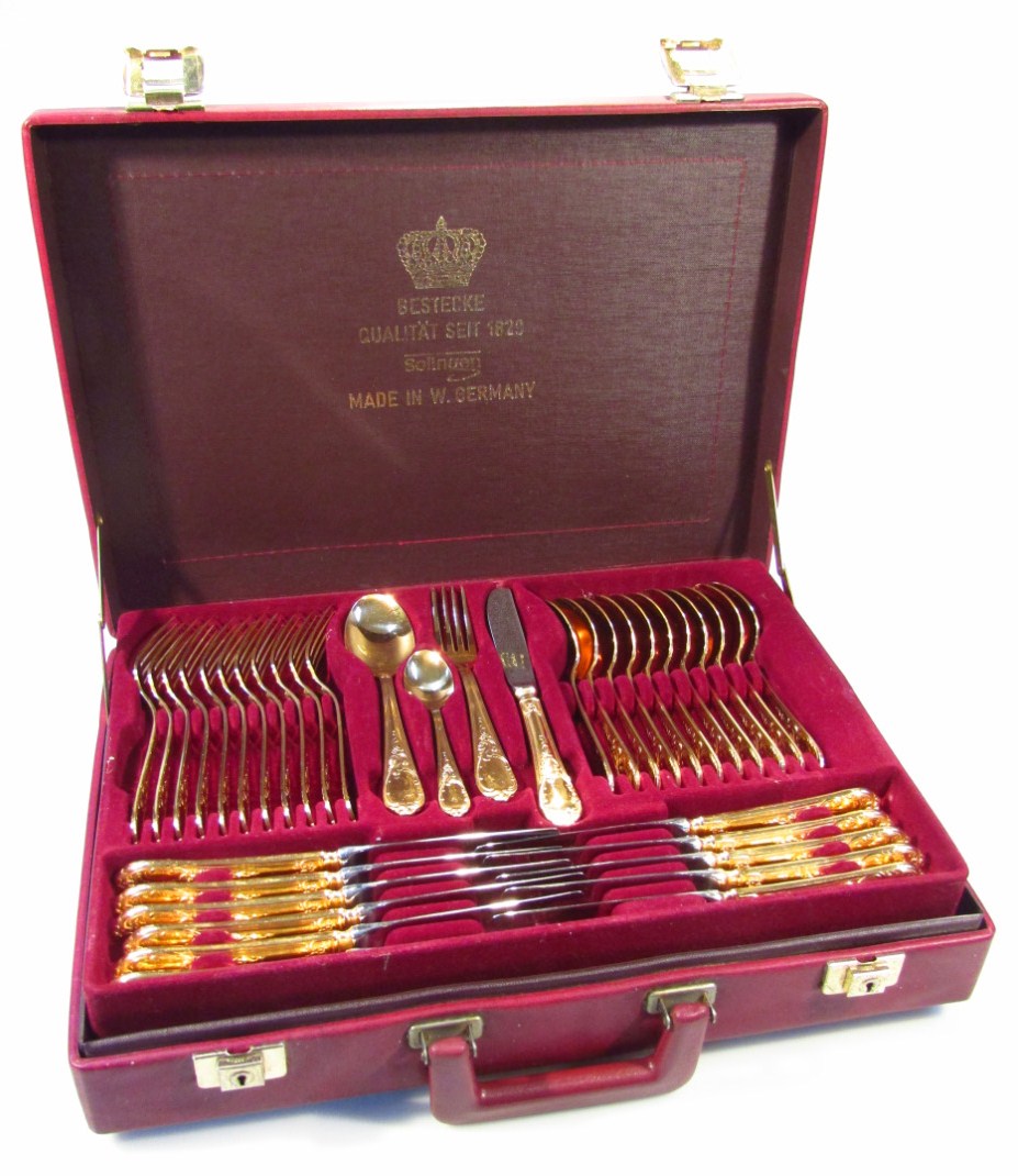 Appraisal: SBS West German Solingen canteen of cutlery with elaborate gold