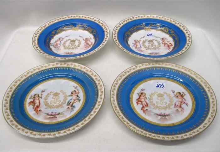 Appraisal: SET OF FOUR SEVRES PORCELAIN PLATES BOWLS hand painted having