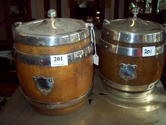 Appraisal: TWO OAK AND SILVER PLATED BISCUIT BARRELS