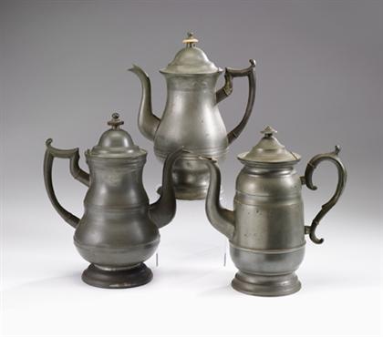 Appraisal: Three pewter coffeepots various makers The first of baluster form