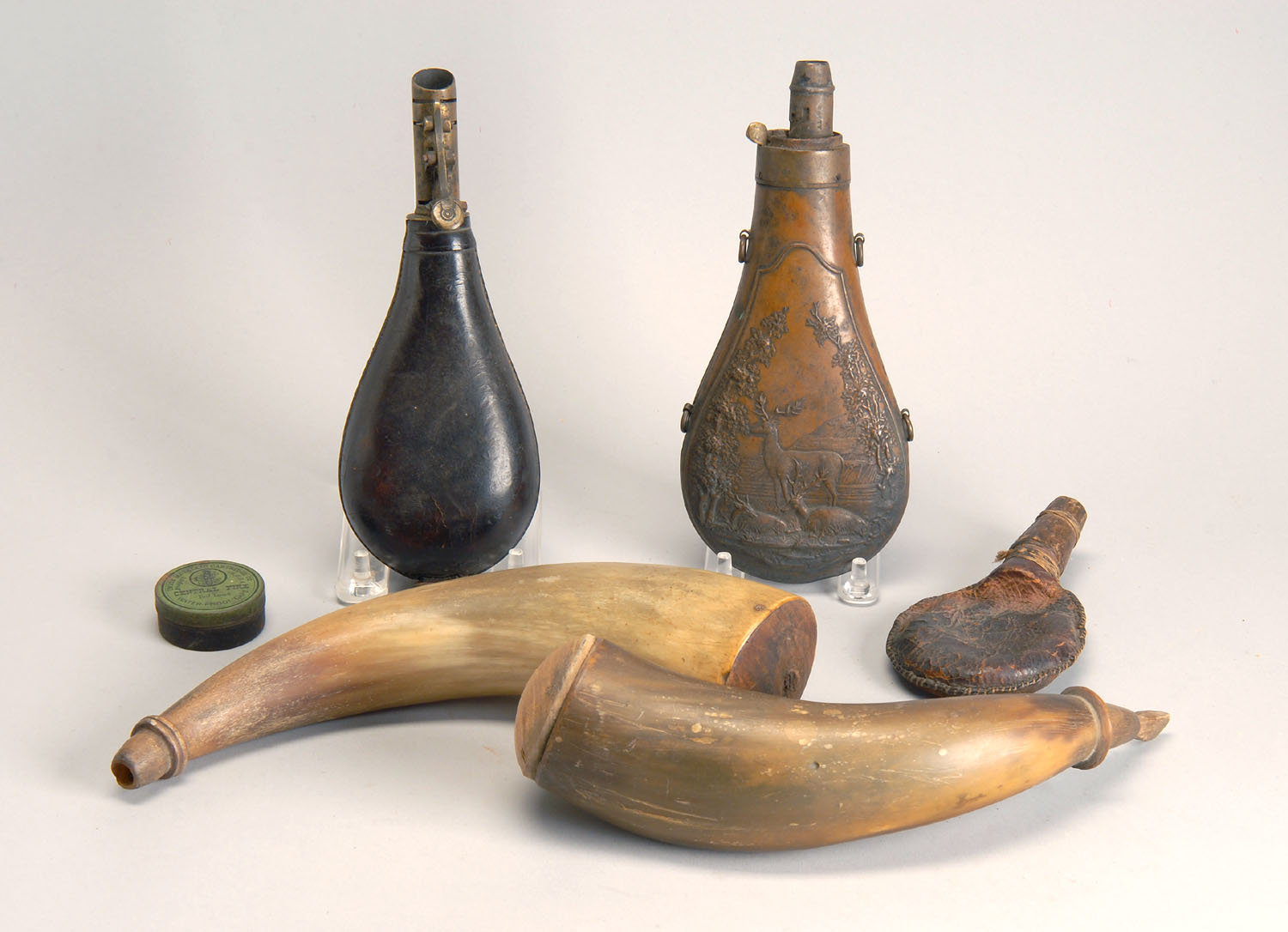 Appraisal: POWDER FLASKS AND HORNS th CenturyIncludes two undecorated powder horns