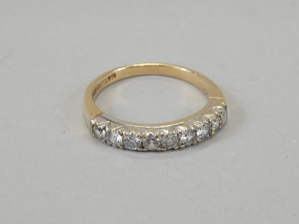 Appraisal: A ladies ct gold half eternity ring set with nine