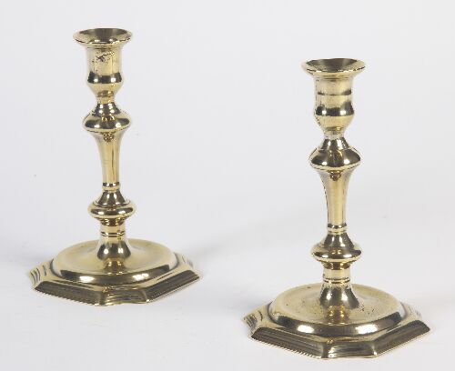 Appraisal: A pair of late th century brass candlesticks each with