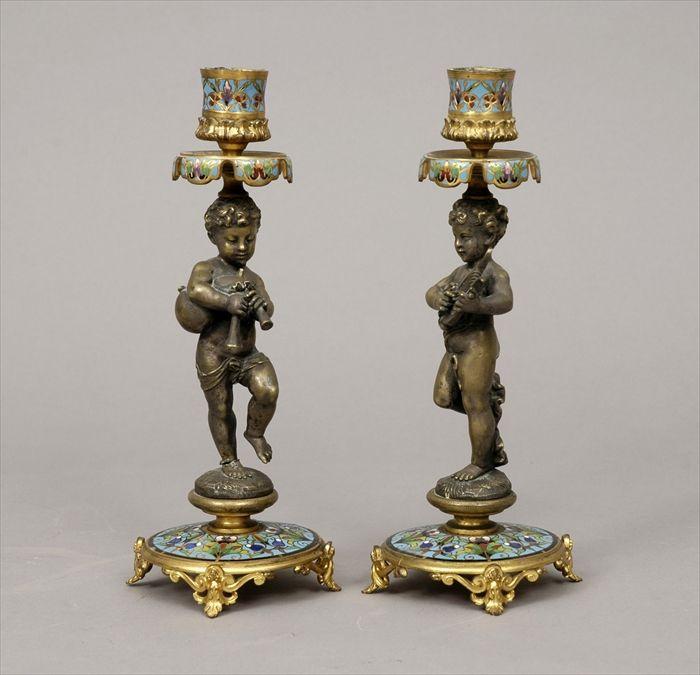 Appraisal: Pair of French Gilt-Metal and Champlev Enamel Candlesticks with Figures