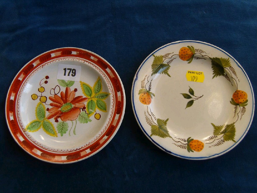 Appraisal: Two early th century creamware plates one with painted floral