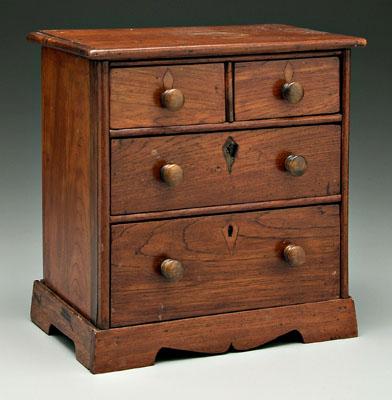 Appraisal: Georgian inlaid walnut miniature chest with two-over-two drawers pine secondary