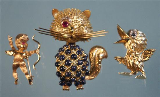 Appraisal: THREE LADIES BROOCHES including K yellow gold and cabochon sapphire