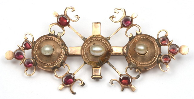 Appraisal: A VICTORIAN GOTHIC REVIVAL BROOCH with triple pearl and amethyst