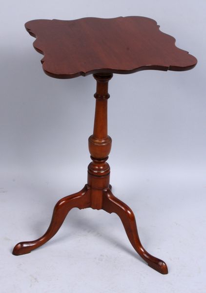 Appraisal: Early American mahogany candlestand having a scalloped top h x