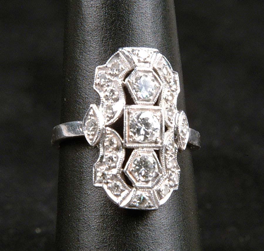 Appraisal: PLATINUM DIAMOND RING Beautiful platinum openwork ring is set with