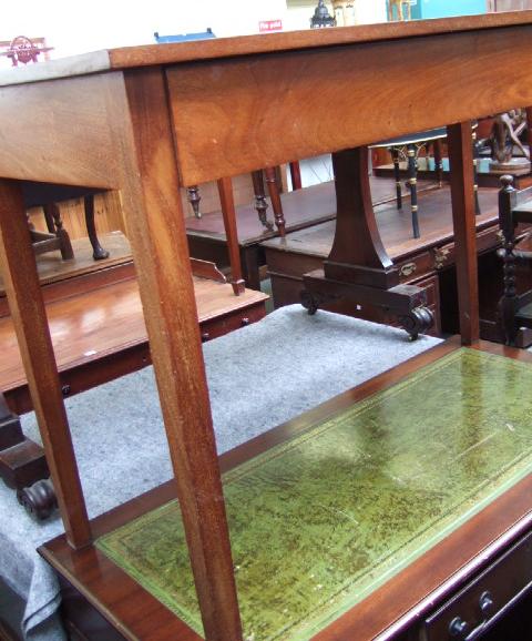 Appraisal: A late th century mahogany side table the rectangular top