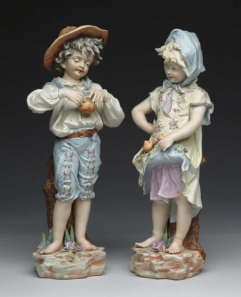 Appraisal: PAIR OF PORCELAIN BOY AND GIRL FIGURES Bases marked P