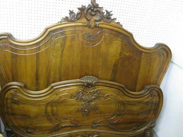 Appraisal: French Victorian Carved Mahogany Bed elaborate carving with rails apprx