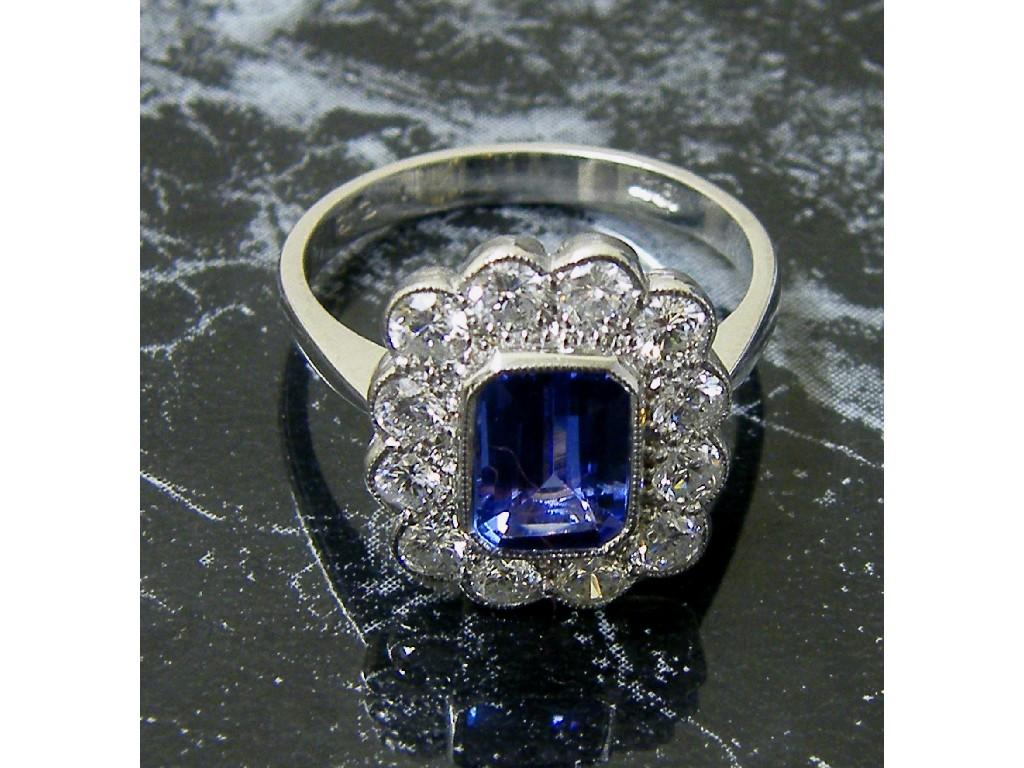 Appraisal: ct white gold sapphire and diamond oval cluster ring sapphire