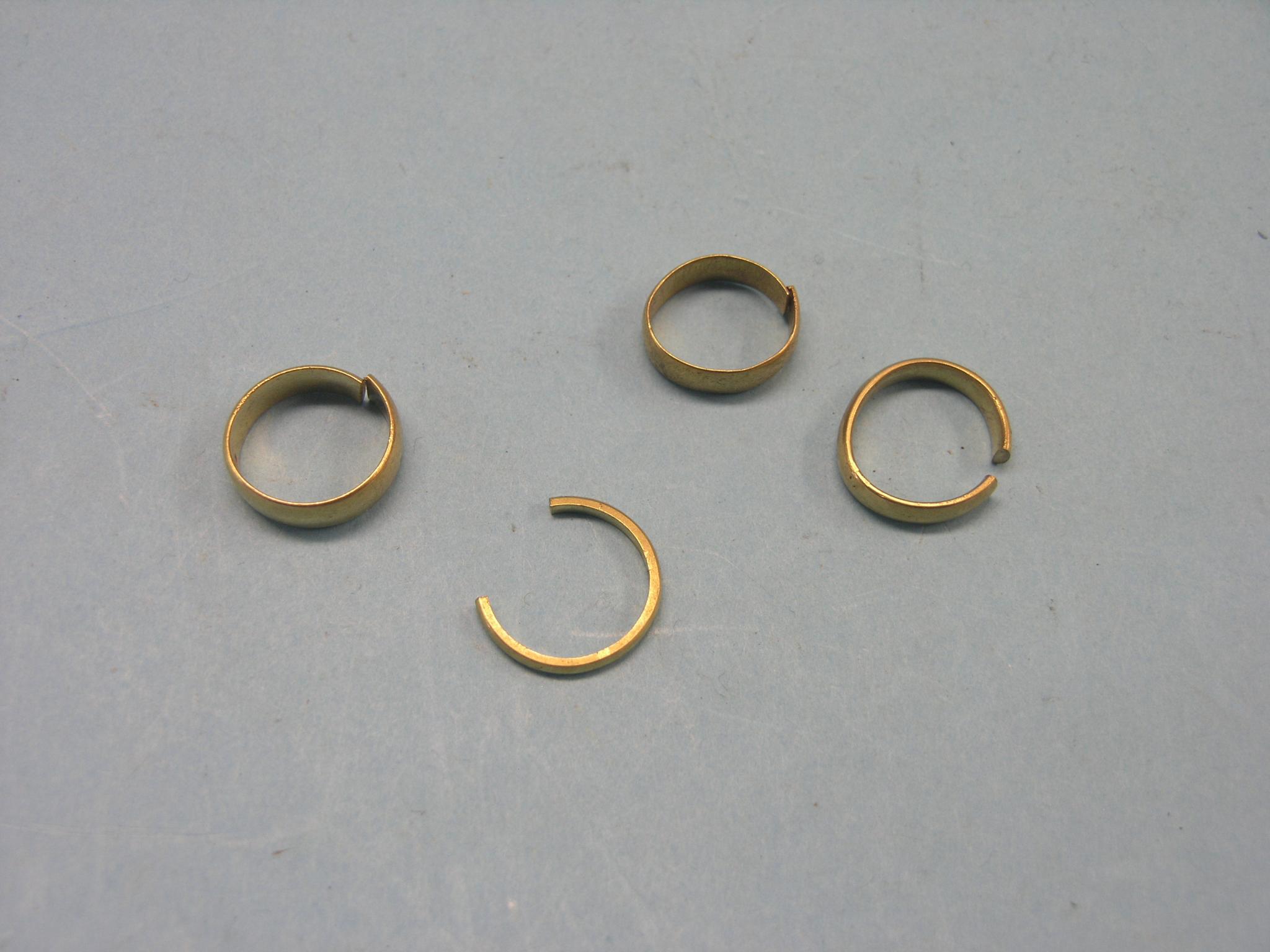 Appraisal: Four various ct gold band wedding rings grams total all