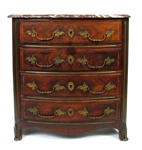 Appraisal: A Regence style inlaid kingwood four drawer commode height in