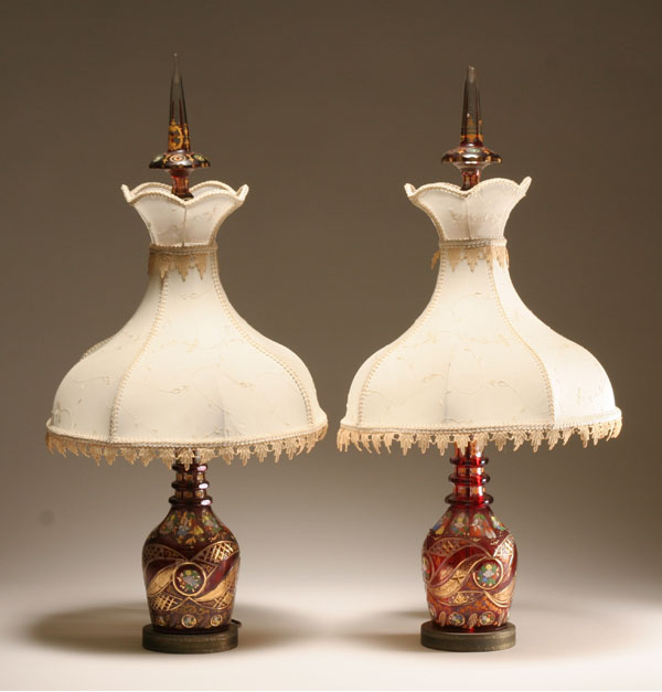 Appraisal: Pair Bohemian flashed cut glass lamps painted accents brass bases