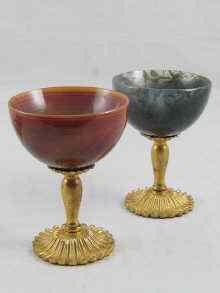 Appraisal: A pair of agate bowled goblets one moss green one