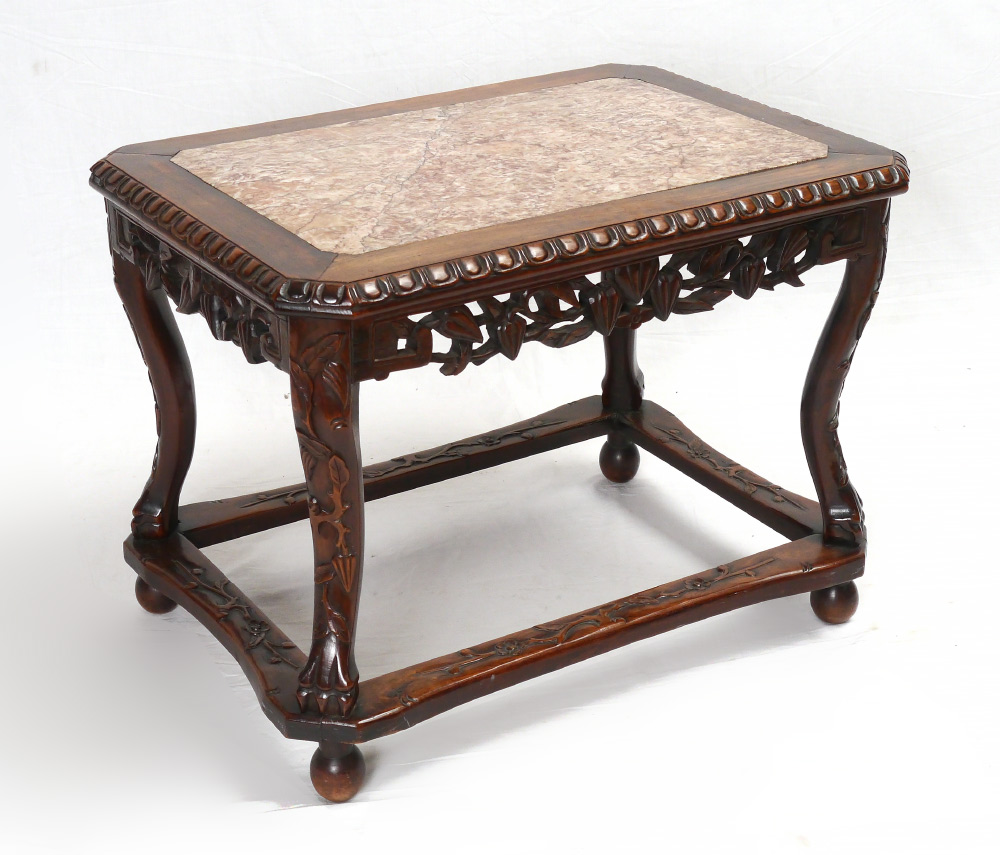 Appraisal: CARVED MARBLE TOP COFFEE TABLE Inset variegated marble top pierced