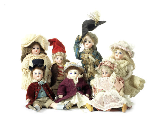 Appraisal: Collection of seven miniature dolls Including two Simon Halbig bisque