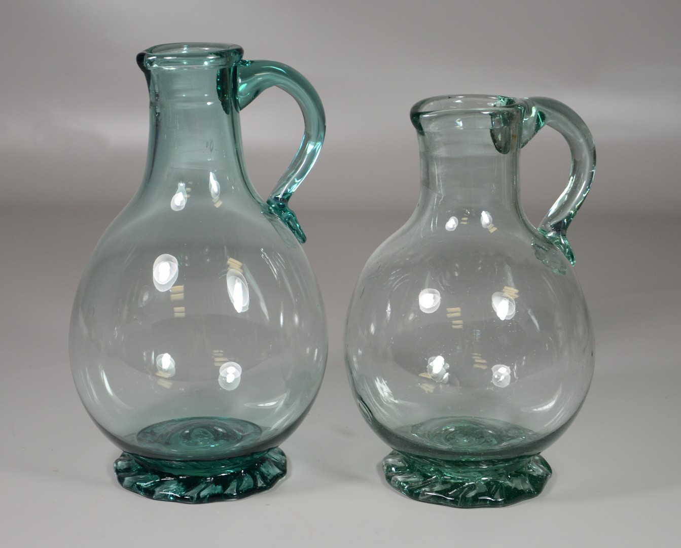 Appraisal: Clevenger Glass Pitchers Clayton NJ late s free blown glass