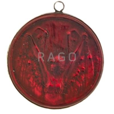 Appraisal: LALIQUE Pendant with winged figure France s Patinated and silver