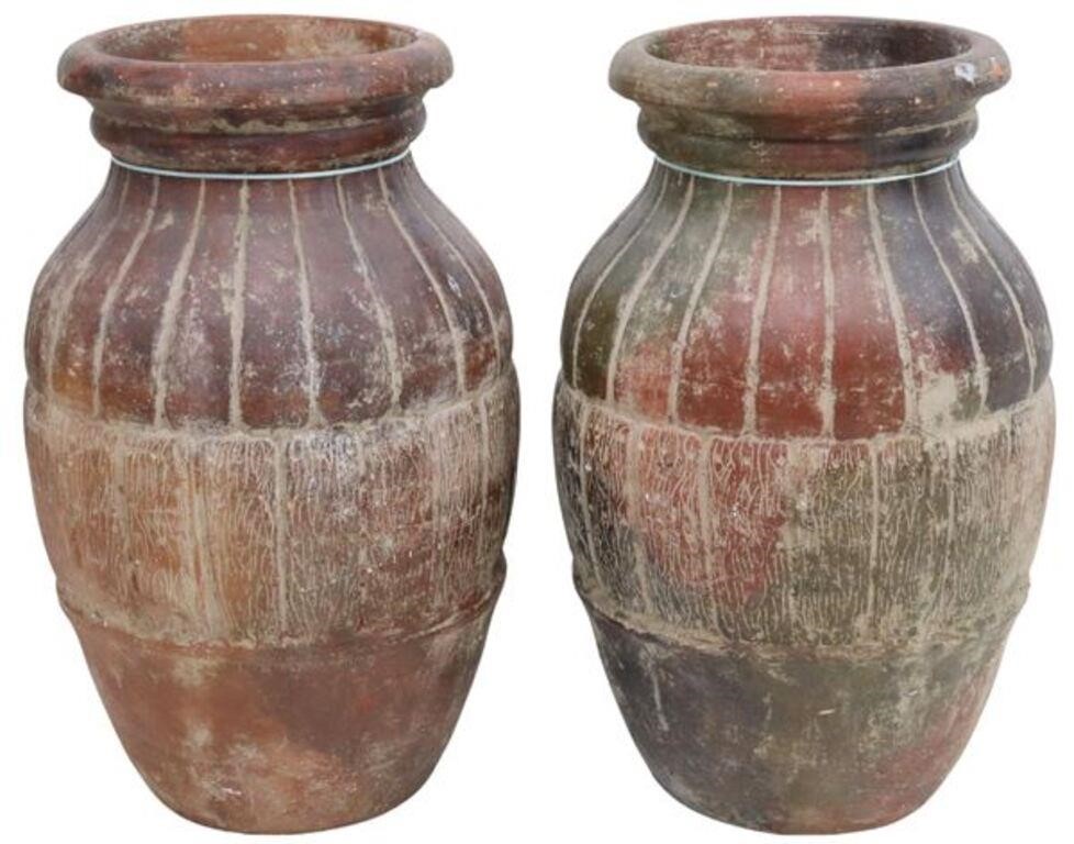 Appraisal: pair Large terracotta olive jar-form garden planters having rolled rim