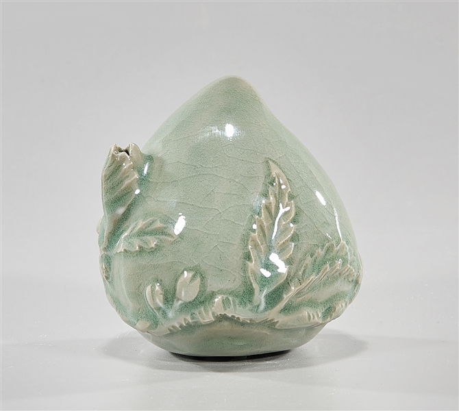 Appraisal: Korean celadon crackle glazed peach form water dropper with molded