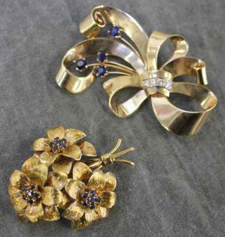 Appraisal: Two Tiffany Co Brooches Includes an kt yellow gold floral