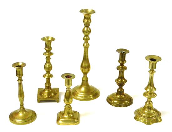 Appraisal: Six th th C non-matching brass candlesticks with circular square