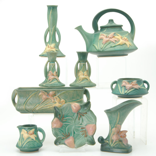 Appraisal: ROSEVILLE Nine green Zephyr Lily pieces a pair of candlesticks