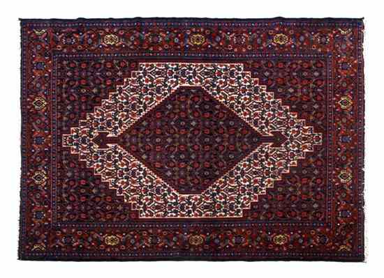 Appraisal: A Senneh Wool Runner having a central lozenge with allover