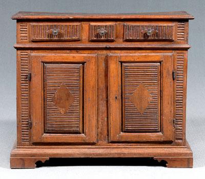 Appraisal: Italian Baroque walnut cabinet three drawers over two doors shelved