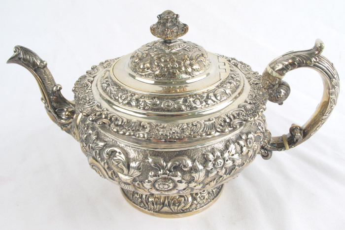 Appraisal: A GEORGE IV STERLING SILVER HALLMARKED ORNATE TEAPOT Edinburgh Scotland