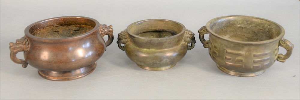 Appraisal: Three Chinese bronze bowl censors ovoid form with iron head