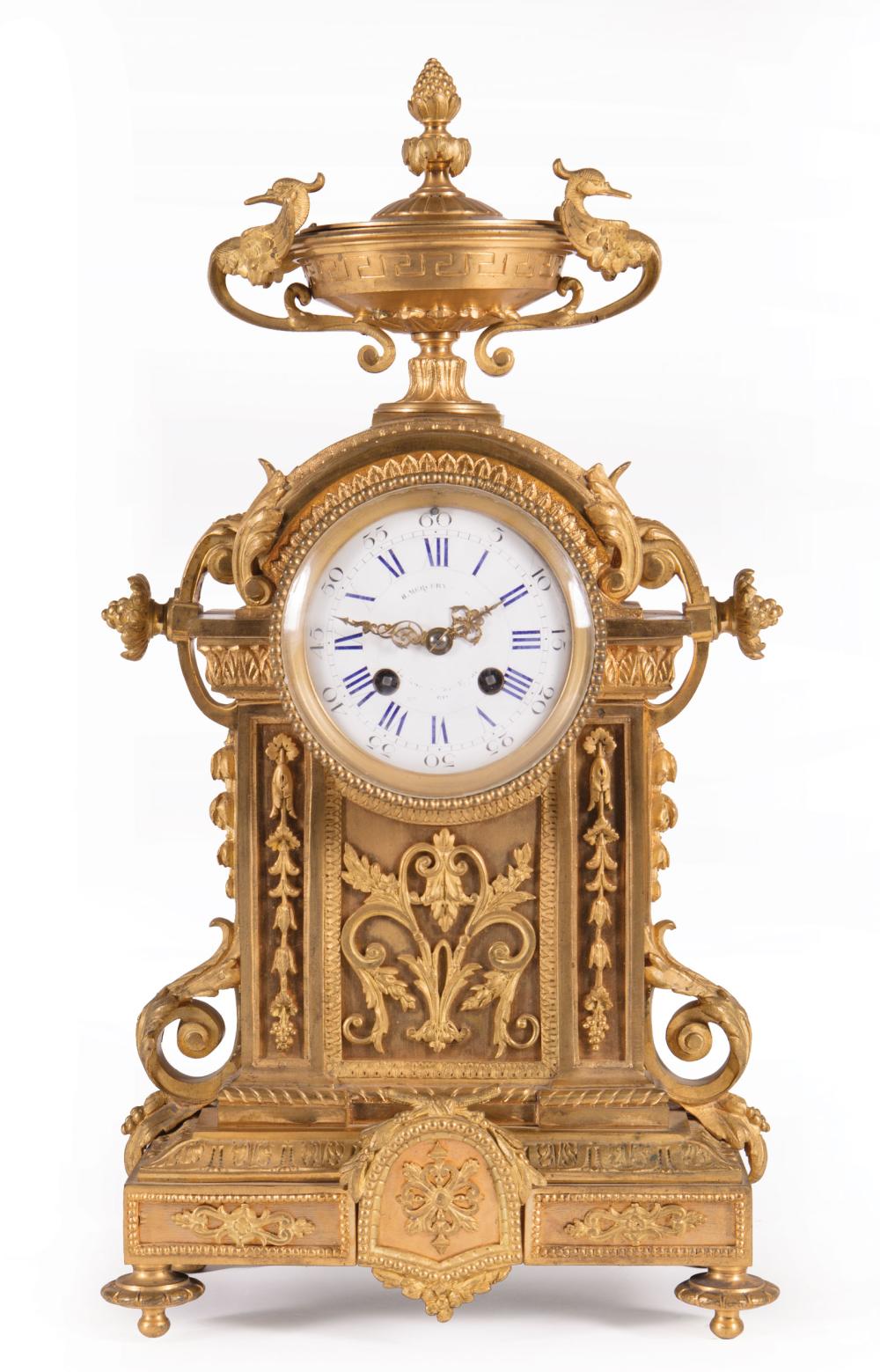 Appraisal: Napoleon III Gilt Bronze Mantel Clock th c urn finial