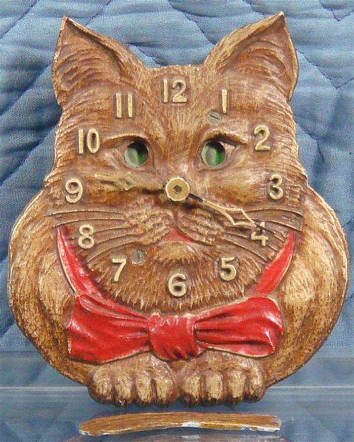 Appraisal: Lux wagging tail novelty cat clock h Estimate -