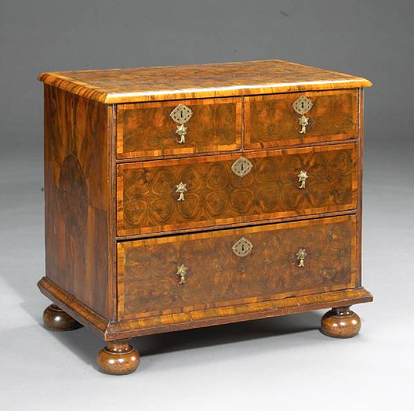 Appraisal: A William and Mary inlaid walnut oyster veneered chest The