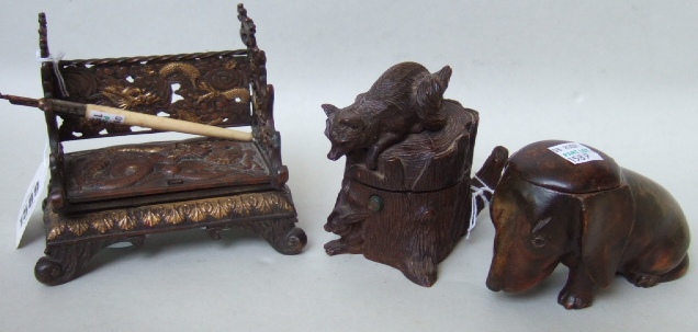 Appraisal: Three novelty inkwells early th century including a Black Forest