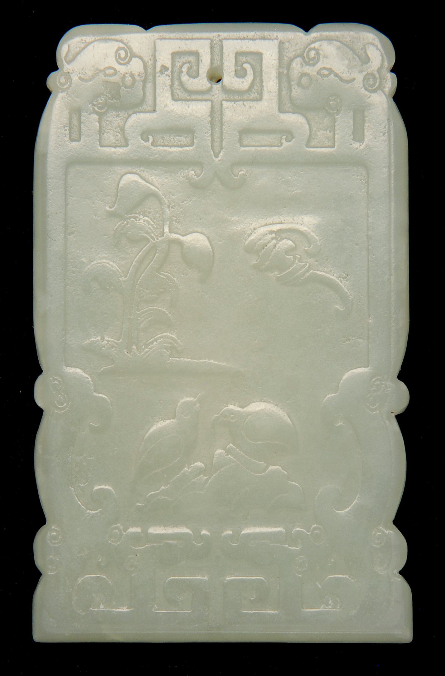 Appraisal: PALE CELADON JADE PENDANT In rectangular form Carved with bat