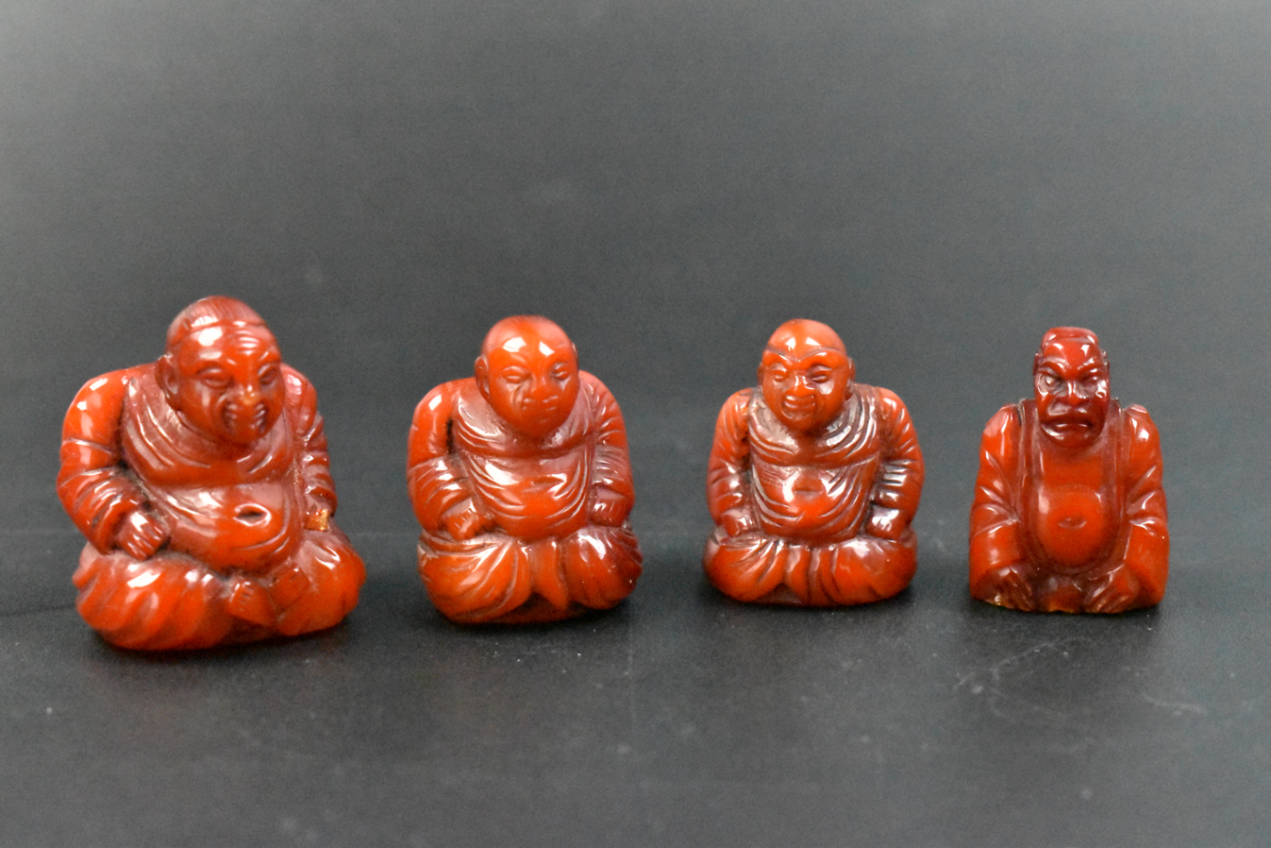 Appraisal: Four Chinese beeswax carved figurines dating from the th century