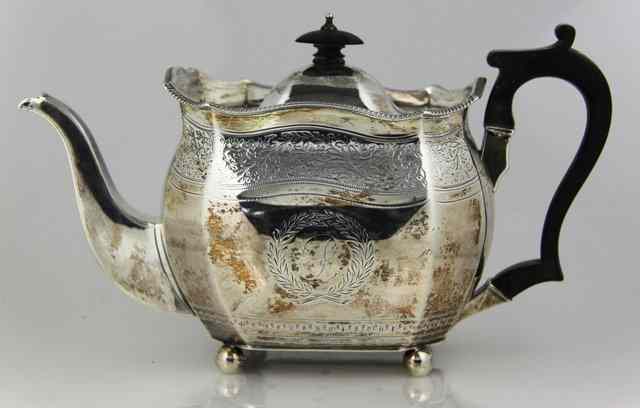 Appraisal: A George III silver teapot AB London of octagonal bellied