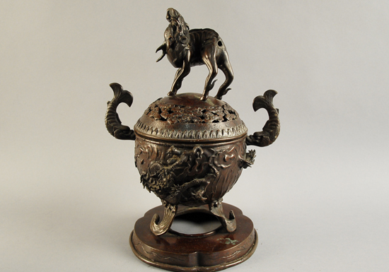 Appraisal: A Chinese Bronze Censer on Stand having a pierced lid