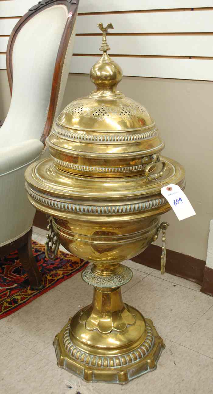 Appraisal: TURKISH BRASS BRAZIER the bowl with twin handles surmounted by