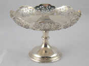 Appraisal: A silver comport matching the above with pierced border by