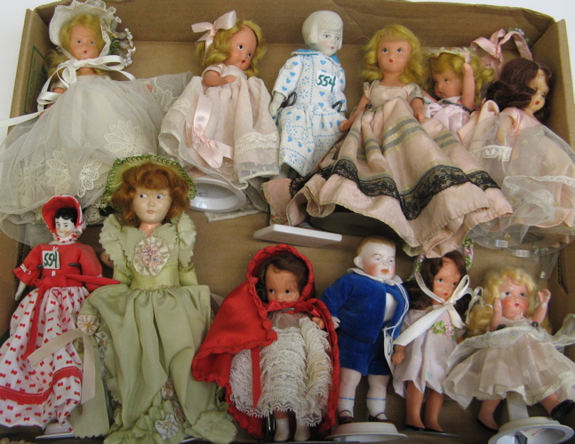 Appraisal: GROUP OF TWELVE MINIATURE DOLLS bisque hard plastic china head