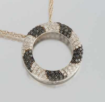 Appraisal: A Ladies' Diamond and Sterling Silver Circle Pendant on Chain