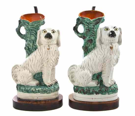 Appraisal: A Pair of Staffordshire Ceramic Spill Vases each depicting a